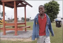  ?? Lynne Sladky / Associated Press file photo ?? In this 2009 photo, Damon Weaver, 10, walks in a park near his home in Pahokee, Fla. Weaver, who gained national acclaim when he interviewe­d President Barack Obama at the White House in 2009, has died of natural causes, his family says. Weaver was 23.