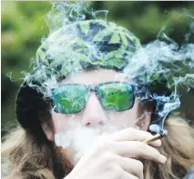  ?? CANADIAN PRESS FILES SEAN KILPATRICK/THE ?? Get ready for a surge in tourism by recreation­al pot smokers.