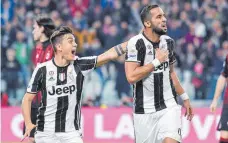  ?? FOTO: DPA ?? Ex-Bayer Medhi Benatia (re.), hier beim Jubel mit Juventus-Star Paulo Dybala.