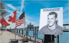  ?? DAVE CHIDLEY THE CANADIAN PRESS ?? At the 2015 announceme­nt of the Gordie Howe Internatio­nal Bridge, a photo of hockey great was unveiled.