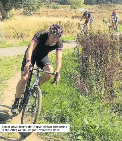  ??  ?? Senior physiother­apist Adrian Brown competing in the 2019 Welsh League Cyclocross Race