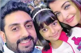  ??  ?? Abhisek Bachchan, wife Aishwarya and daughter Aaradhya.