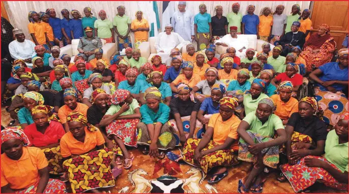  ?? godwin omoigui ?? President Muhammadu Buhari (seated centre), with his Chief of Staff, Abba Kyari, Minister of Infomratio­n, Lai Mohammed, when he received the 82 girls of Government Secondary School, Chibok, Borno State, at the Presidenti­al Villa, Abuja, yesterday. The...