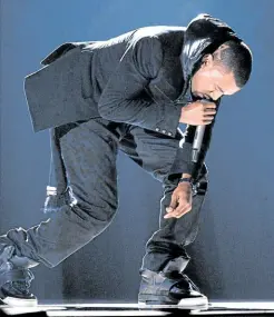  ??  ?? Kanye West performs at the 2008 Grammy Awards in Los Angeles wearing the Nike Air Yeezy 1 Prototypes.