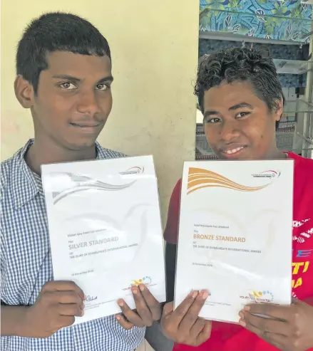  ?? Photo: Shratika Naidu ?? Labasa School For Special Education silver awardee Vishal Sami (left) and bronze awardee Selai Wainiqolo in Labasa on November 16, 2018.