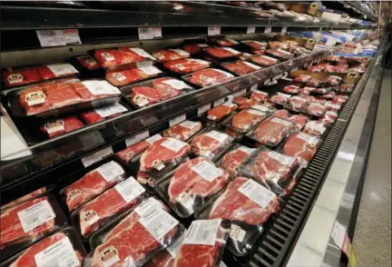  ?? GERALD HERBERT — THE ASSOCIATED PRESS FILE ?? Meat is displayed at a grocery store in River Ridge, La. On Thursday, the Labor Department reported on U.S. consumer prices for August.