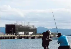  ?? Jeff Chiu Associated Press ?? A FLOATING BARGE in San Francisco Bay may become “an interactiv­e space where people can learn about new technology,” Google says.