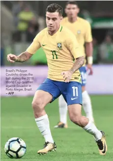  ?? — AFP ?? Brazil’s Philippe Coutinho drives the ball during the 2018 World Cup qualifier against Ecuador in Porto Alegre, Brazil.