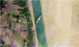  ?? Photograph: Planet Labs/AFP/Getty Images ?? The Taiwan-owned MV Ever Given lodged sideways across the Suez canal.