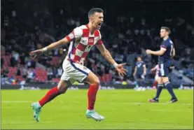  ??  ?? Perisic celebra el gol que marcó contra Escocia en el último partido