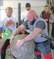  ?? Photograph: Iain Ferguson, alba.photos. ?? Overall winner James Haplin competes in the stone lift.