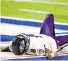  ?? ADRIAN KRAUS/ ASSOCIATED PRESS ?? Ravens quarterbac­k Lamar
Jackson reacts to his second-half injury in Baltimore’s 17-3 divisional playoff loss Saturday night to the Buffalo Bills. Even before the injury, Baltimore’s offense was ineffectiv­e, perhaps signaling a change is necessary.