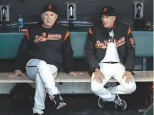  ?? Gabrielle Lurie / The Chronicle ?? Giants’ manager Bruce Bochy (left) with longtime pitching coach Dave Righetti, who will take a front-office role.