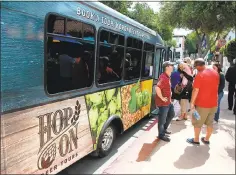  ?? PHOTO COURTESY HOP ON BEER TOURS ?? San Luis Obispo’s three-year-old Hop On Beer Tours offer Central Coast brewery, winery and Distillery tours via tricked-out buses that include hardwood floors, leather seats and a bar.