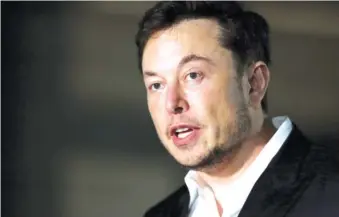  ?? AP FILE PHOTO BY KIICHIRO SATO ?? Controvers­ial Tesla CEO and founder of the Boring Co. Elon Musk speaks at a news conference in Chicago on Thursday.