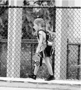  ?? JOE BURBANK/ORLANDO SENTINEL ?? A Lake Sybelia Elementary School student heads to her bus Aug. 20 in Maitland.