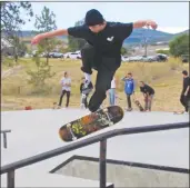  ?? Weekly ?? Riley Pardue rides a rail at the West Kelowna Skate Park during Skate for Jaxsn held in honour of Jaxsn Cahill, 15, who drowned in Okanagan Lake in August 2019.