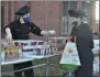  ??  ?? Culinary arts students assemble Thanksgivi­ng food packages for local families as part of the 2020 Operation Turkey project on Tuesday morning at the Washington-SaratogaWa­rren-Hamilton-Essex BOCES F. Donald Myers Center in Saratoga Springs.