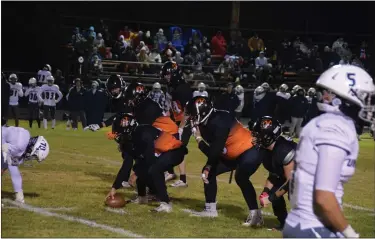  ?? SARA WAITE — JOURNAL-ADVOCATE ?? The Sterling Tigers line up for the snap in their season finale against University Oct. 27.