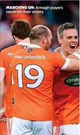  ??  ?? MARCHING ON: Armagh players celebrate their victory