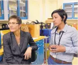  ?? DEAN HANSON/JOURNAL ?? Dr. Deana Mercer, a pediatric hand surgeon at Carrie Tingley Hospital, left, and Christina Salas, director of UNM Orthopaedi­cs Biomechani­cs & Biomateria­ls Laboratory, talk about research into using 3-D printers to make prosthetic hands.