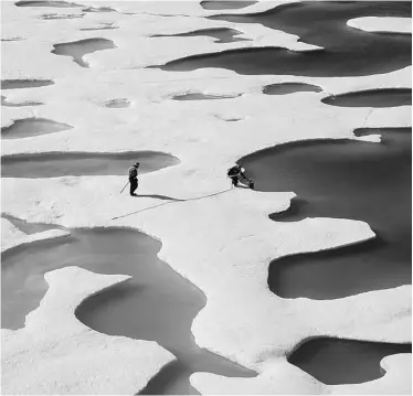  ?? PHOTOS: SUPPLIED ?? NASA scientists collect data from thawing Arctic ice during the agency’s ICESCAPE mission in July. Ice loss this summer shattered the record set in 2007, and what’s left is no longer thick and solid.