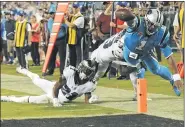  ?? MIKE MCCARN — THE ASSOCIATED PRESS ?? Then-Panthers quarterbac­k Cam Newton dives short of the goal line as the Eagles’ Patrick Robinson (21) and Rodney McLeod during a 2017 game.