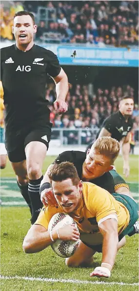  ??  ?? Try time: Bernard Foley scores for the Wallabies yesterday