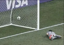  ?? Darko Bandic/Associated Press ?? Panama goalkeeper Jaime Penedo allows a goal by England’s Jesse Lingard. England scored five times in the first half of its 6-1 win Sunday.