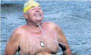  ??  ?? JUST BREATHING: Peter Moore , 54, hopes to swim 7km next month