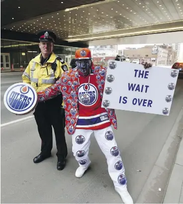  ?? GREG SOUTHAM ?? Blair Gladue cheers on the Oilers outside Rogers Place Wednesday as the club prepared to host San Jose for Game 1 of their Western Conference quarter-final.