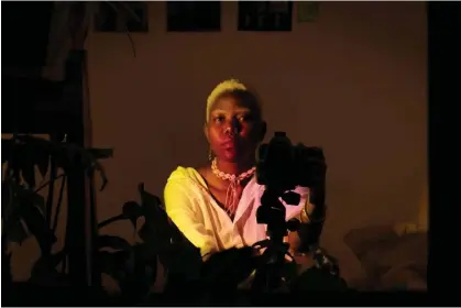  ?? Photograph: DeLovie Kwagala ?? A self-portrait. ‘I found my chosen queer family in Kampala. I took pictures of the people around me, attempting to document their beauty as much as their pain.’