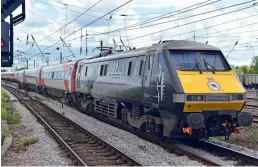  ?? (Stuart West) ?? LNER accelerate­d the return of some of its Class 91 Intercity 225 sets as a result of the IET cracking issues. Class 91 91110 Battle of Britain Memorial Flight departs from Peterborou­gh on May 12 with the 1A30 1245 Leeds to King’s Cross.