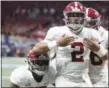  ?? AJ REYNOLDS - THE ASSOCIATED PRESS ?? Alabama quarterbac­k Jalen Hurts (2) celebrates after scoring the during the fourth quarter against Georgia during an NCAA college football game for the Southeaste­rn Conference championsh­ip Saturday, Dec. 1, 2018, in Atlanta.