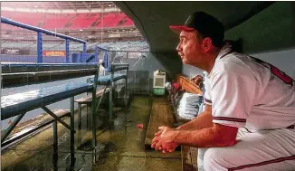  ?? AJC 1996 ?? The Braves’ then-pitching coach, Leo Mazzone, told manager Bobby Cox “if we need a left-handed reliever, Greg McMichael can be our left-handed reliever.” McMichael was right-handed.