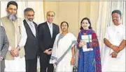  ??  ?? Abdul Basit (Centre-left) with Mamata Banerjee (C) in Kolkata. PTI