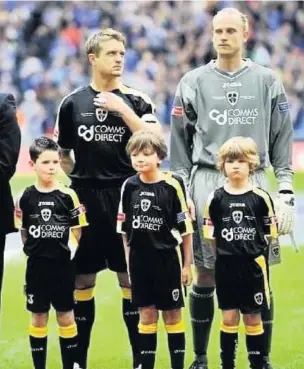  ??  ?? Liam, centre, was a mascot at the 2008 FA Cup final between Cardiff City and Portsmouth