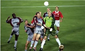  ?? Photograph: Gary M Prior/Getty Images ?? Manchester United’s Peter Schmeichel challenges Thomas Linke in the Bayern Munich penalty area during the 1999 European Cup final.