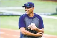  ?? TONY GUTIERREZ AP ?? Rays manager Kevin Cash says officials from the commission­er’s office had a meeting with managers Tuesday.
