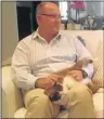  ??  ?? LAP OF LUXURY: Mayor Athol Trollip and his cat, Fabio