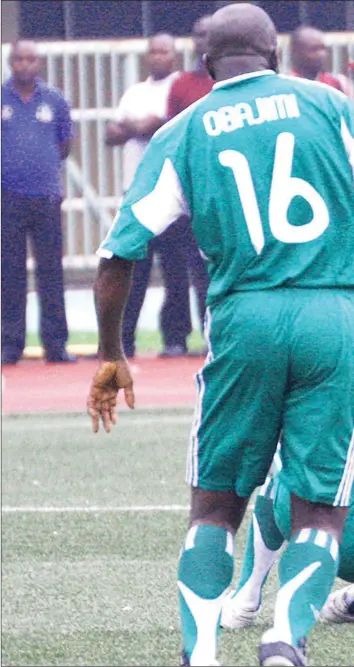  ??  ?? Adesina tries to re-enact his football skills at the National Stadium, Surulere, Lagos
