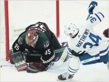  ??  ?? Arizona Coyotes goaltender Darcy Kuemper makes a save on shot by Toronto Maple Leafs centre Auston Matthews on Saturday.