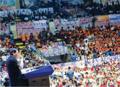  ??  ?? BATANGAS CAMPAIGN SORTIE – President Duterte delivers a speech during the PDP-Laban campaign rally at the Batangas City Sports Coliseum in Batangas City Wednesday. During the rally the President endorsed Sen. JV Ejercito as a guest candidate of the party. (Malacanang photo)