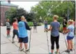  ?? MICHILEA PATTERSON — DIGITAL FIRST MEDIA ?? A group of educators participat­e in a Nordic walking seminar at Pottstown Middle School during the “Healthy Bodies, Healthy Minds Institute.” The educators learned how they could incorporat­e the European activity into the school day.