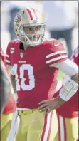  ?? Sarah Stier / Getty images ?? Jimmy Garoppolo suffered a sprained ankle last week and the 49ers will have nick mullens take over for him.