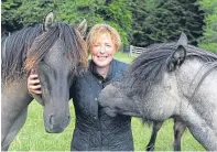  ??  ?? Pony manager Sylia Ormiston with Balmoral yearlings