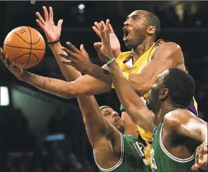  ?? Branimir Kvartuc / Associated Press ?? In this Feb. 23, 2007, file photo, Los Angeles Lakers’ Kobe Bryant, top, goes up for a shot between Boston Celtics’ Paul Pierce, left, and Al Jefferson during the first half in Los Angeles. Bryant was one of eight finalists announced Friday as candidates for enshrineme­nt into the Basketball Hall of Fame later this year, a decision that came as absolutely no surprise in his first year of eligibilit­y.