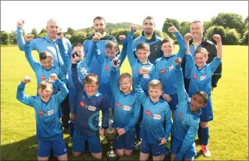  ??  ?? North End United celebrate after winning the Under-11 Jack Carthy Memorial Cup.