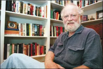  ?? TODD BENNETT/ATHENS BANNER-HERALD VIA AP ?? Author Terry Kay poses in his home in Athens, Ga on Aug. 1, 1997.