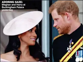  ??  ?? ADORING GAZE: Meghan and Harry at Buckingham Palace yesterday